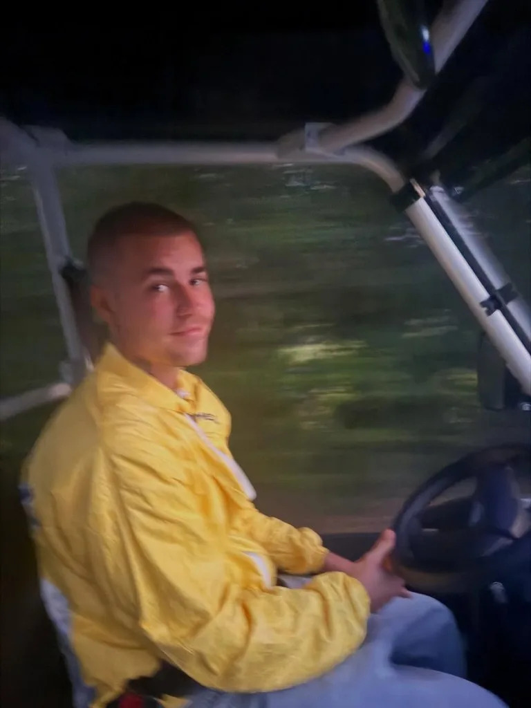 The pop star shared the smooching pic on Instagram as well as one of him driving a golf cart. Instagram/Justin Bieber