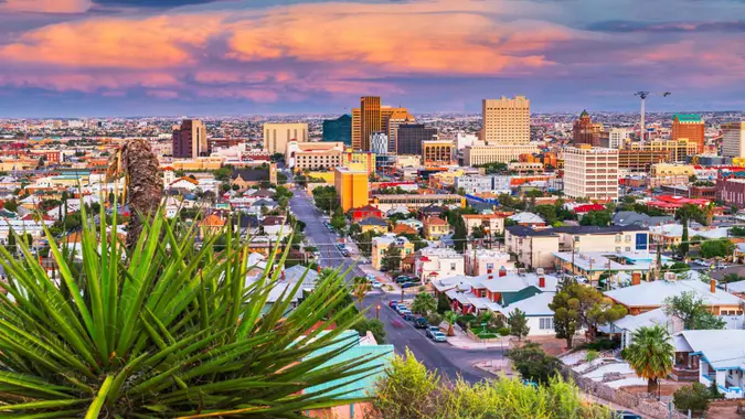 El Paso, Texas, USA  downtown city skyline at dusk with Juarez, Mexico in the distance.
