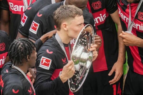 Bayer Leverkusen midfielder Florian Wirtz kisses the Bundesliga trophy after a 2-1 win over Augsburg (Michael Probst/AP/PA)