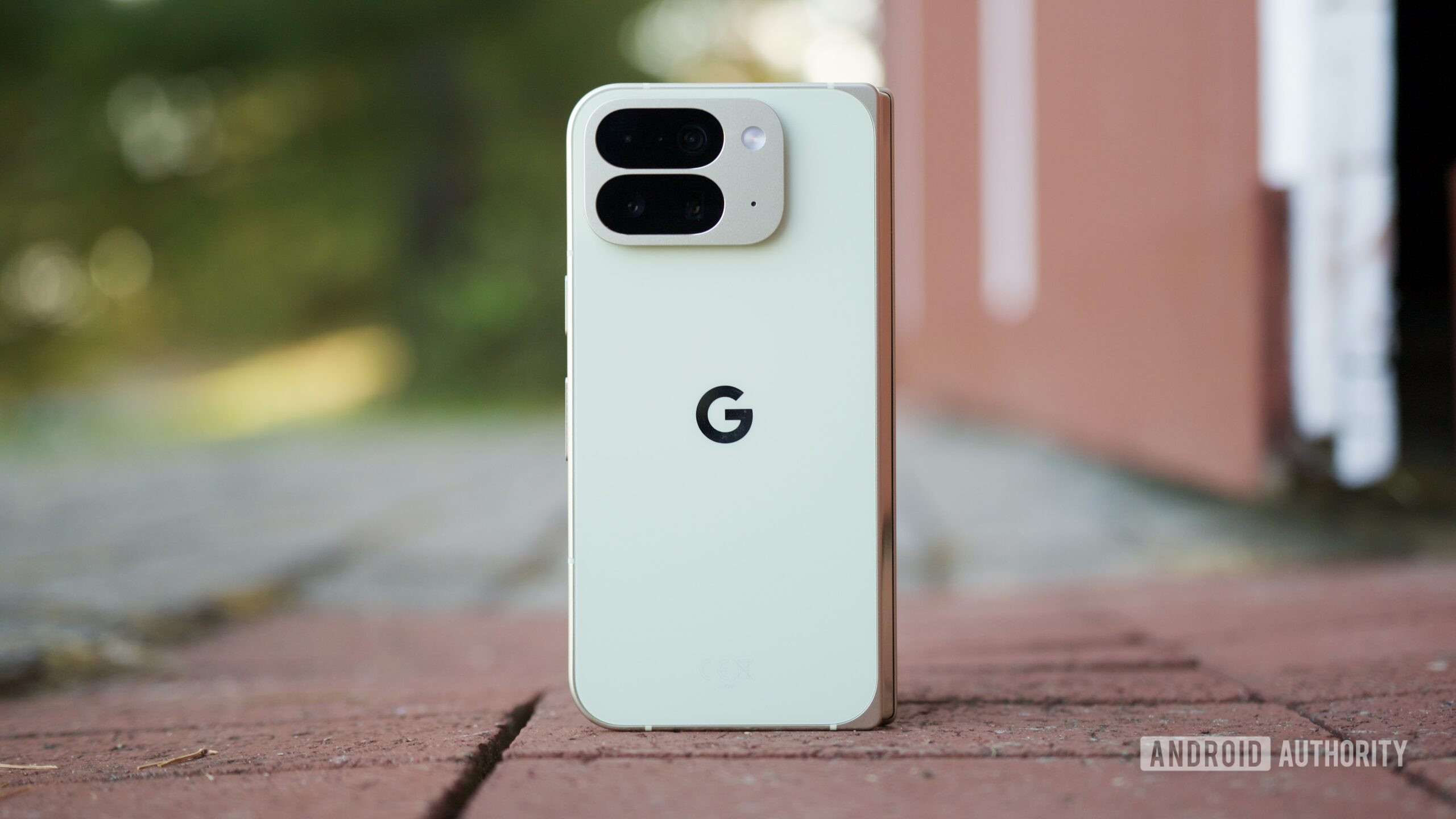The Google Pixel 10 Pro Fold standing upright outside.