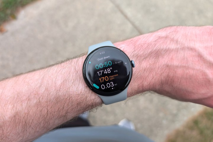Someone wearing the Google Pixel Watch 3 showing the running UI.