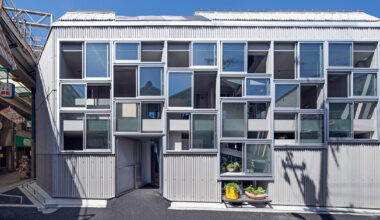 grid-like facade fronts osaka residence by okuwada architects