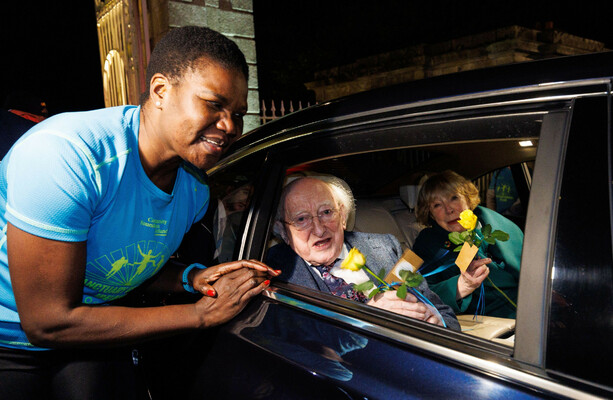 President Higgins and wife Sabina given roses and cheered as they leave Áras for the final time - The Journal
