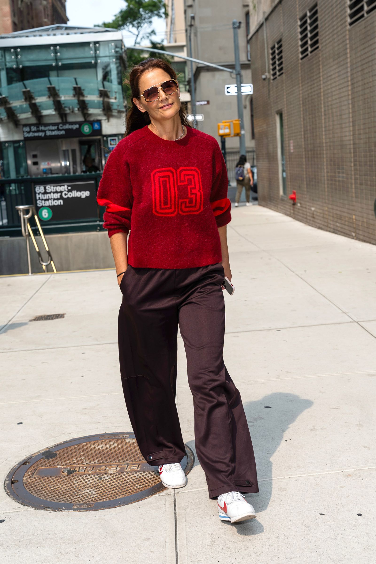 Katie Holmes wearing Nike Cortez sneakers