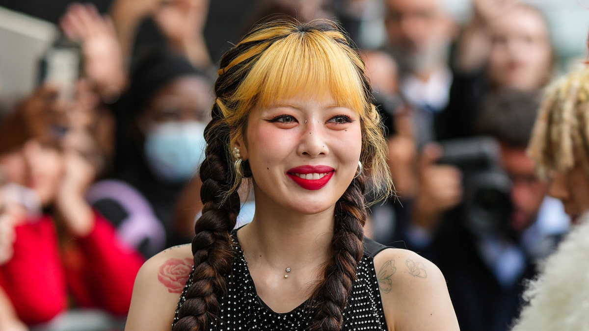 HuynA attends Paris Fashion Week