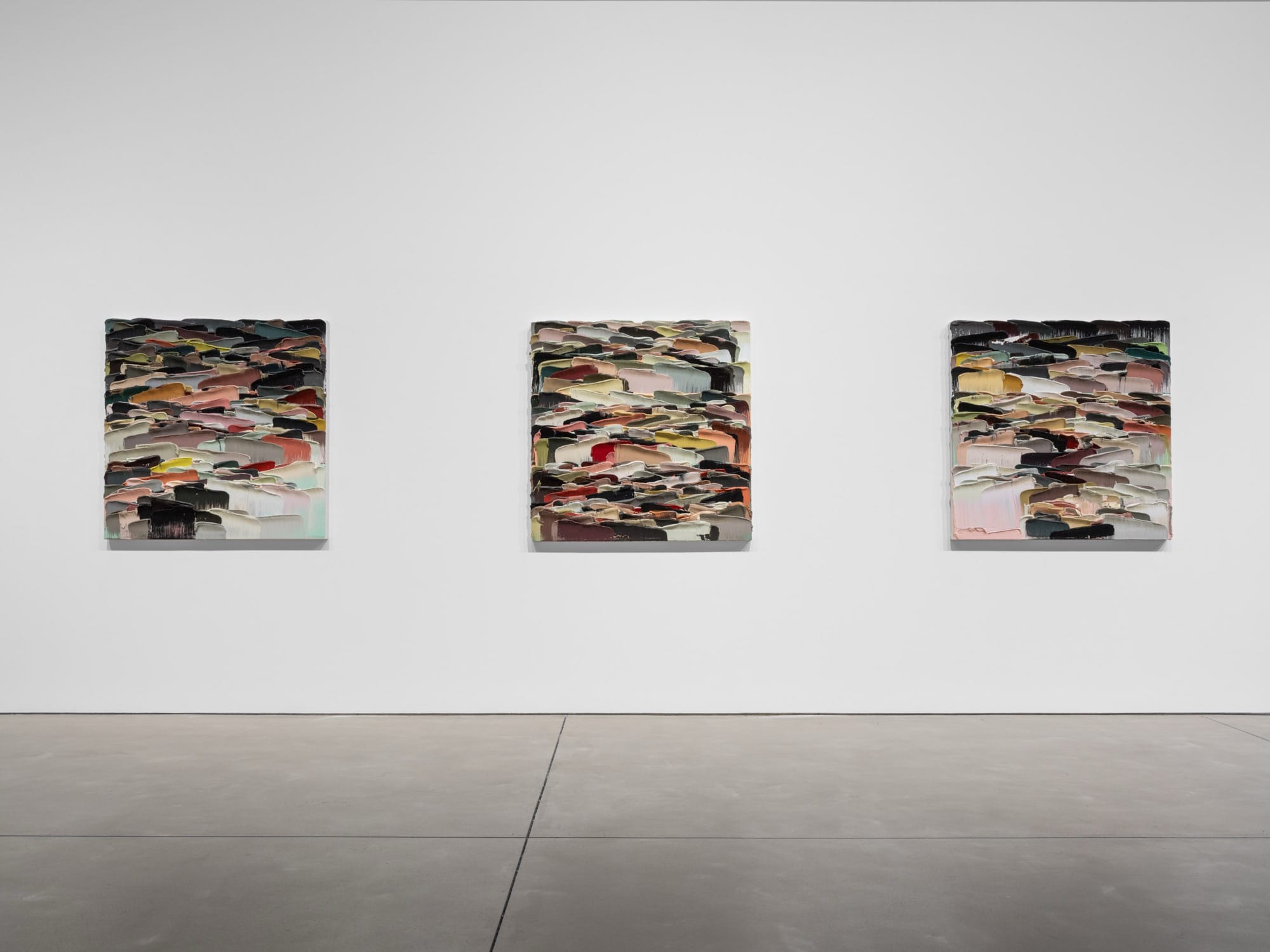 an installation view of paintings by Li Songsong