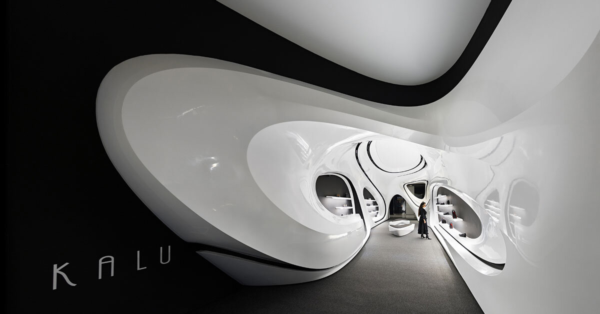 fluid black and white interiors connect curved mall corridors in tehran