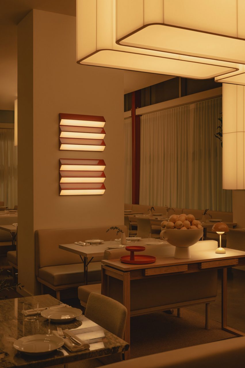 Restaurant bathed in warm yellow light at night