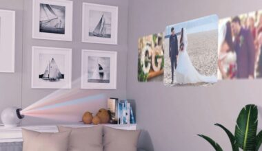A projector sits on a side table, projecting wedding and couple photos onto a wall above a sofa, which is decorated with framed sailboat pictures and a green plant nearby.
