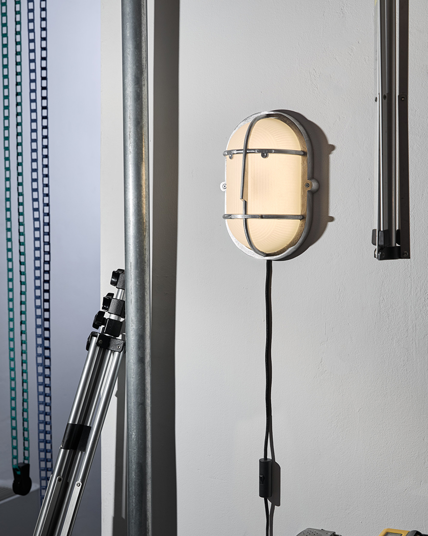 philippe tabet reimagines industrial bulkhead lamp as face-like lighting fixture