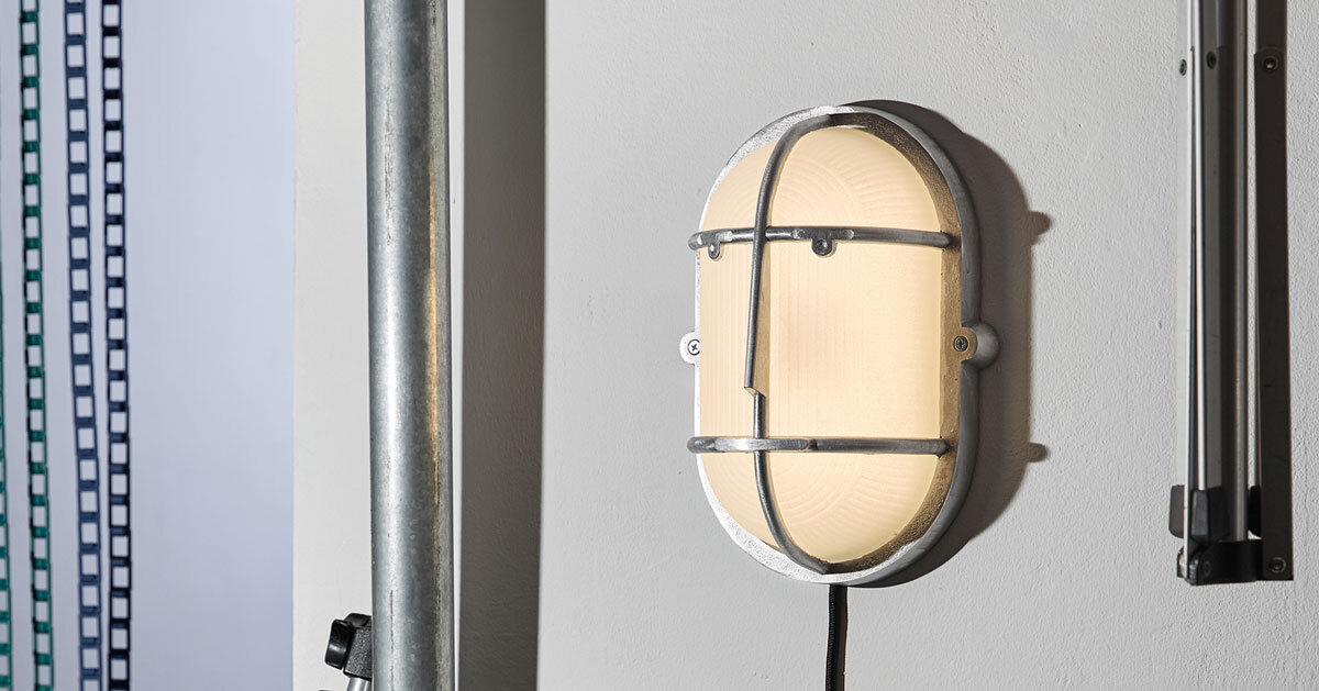 philippe tabet reimagines industrial bulkhead lamp as face-like lighting fixture