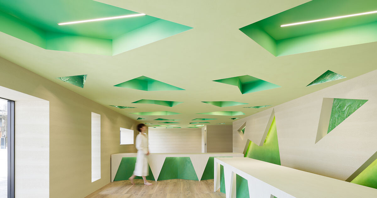 polygonal green cutouts animate kakushin tokyo office's interiors by moriyuki ochiai