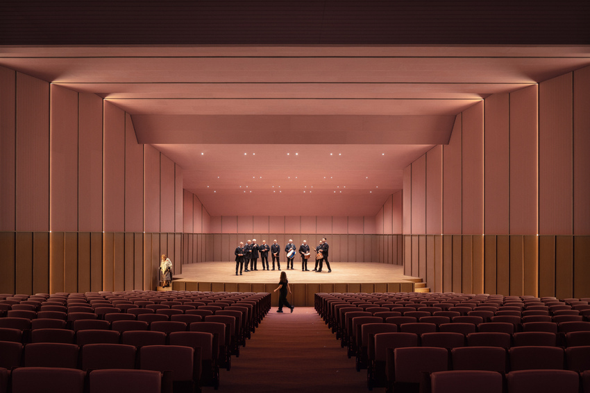 bright pink interior revitalizes adaptive acoustic music hall for sax’s cultural complex in spain
