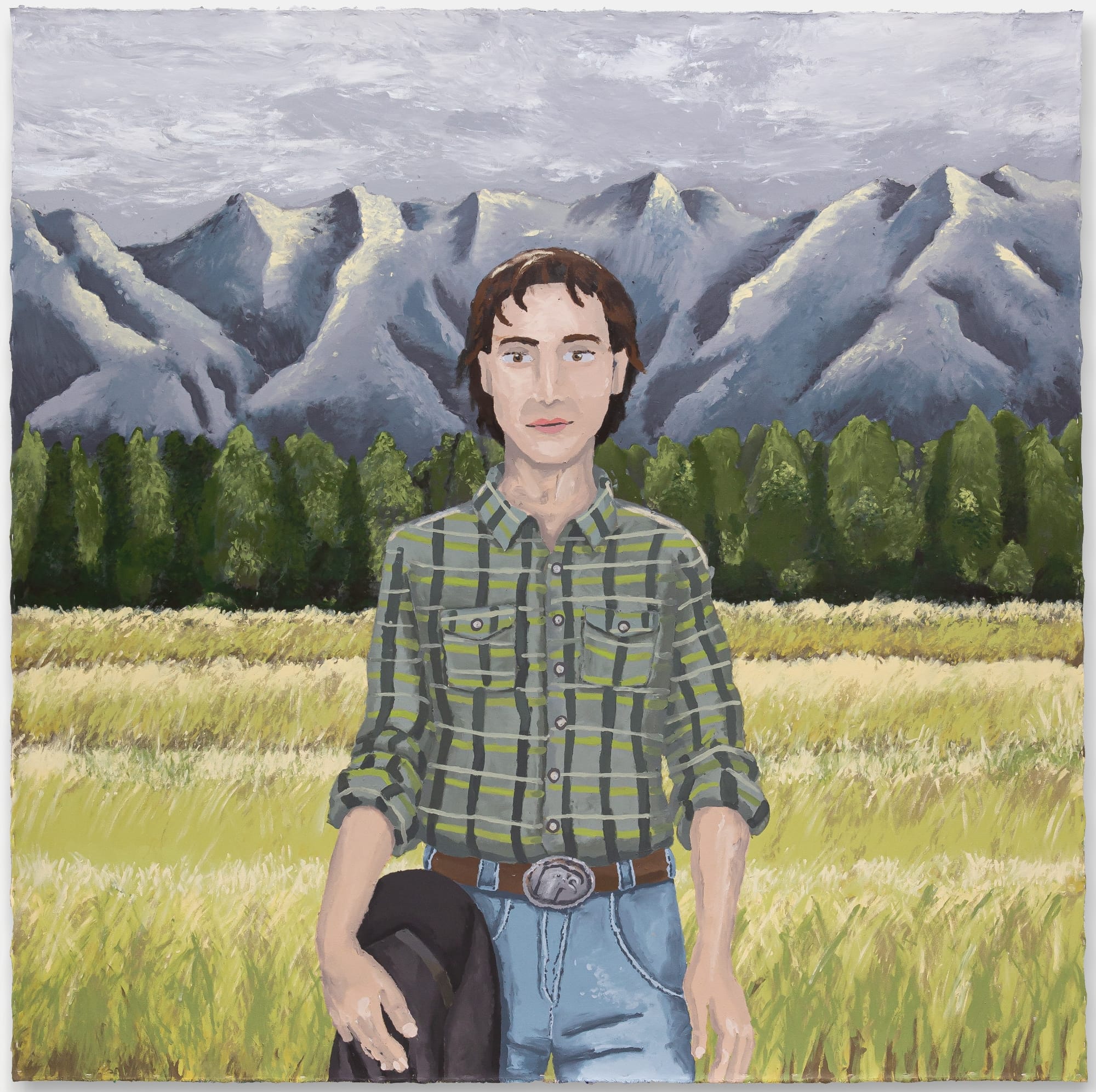 a painting by Manuela Solano of a cowboy in front of the mountains