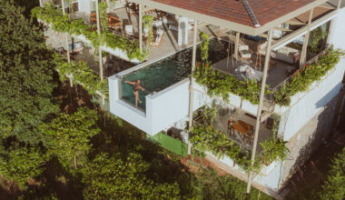 cantilevered swimming pool extends out from studio saxe's 'villa nuri' in costa rica
