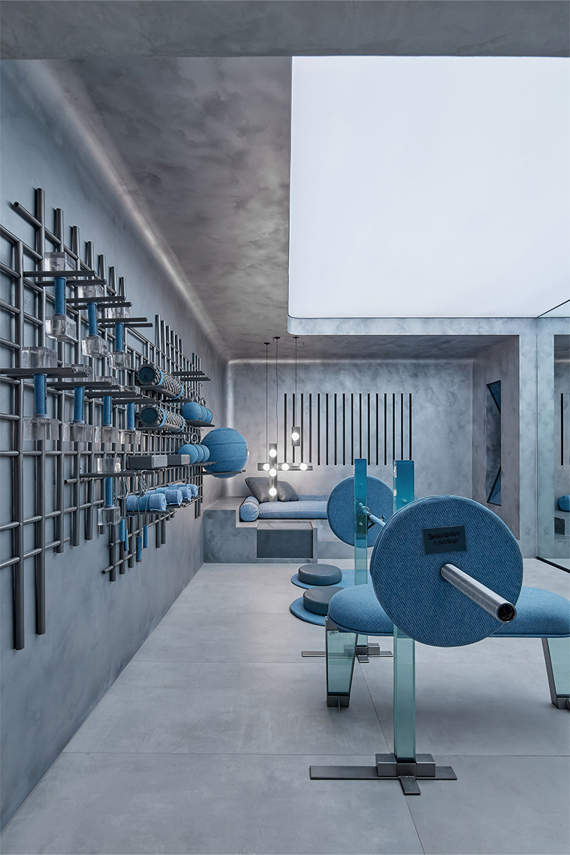 denim wraps workout equipment within sutura sculptural gym in mexico