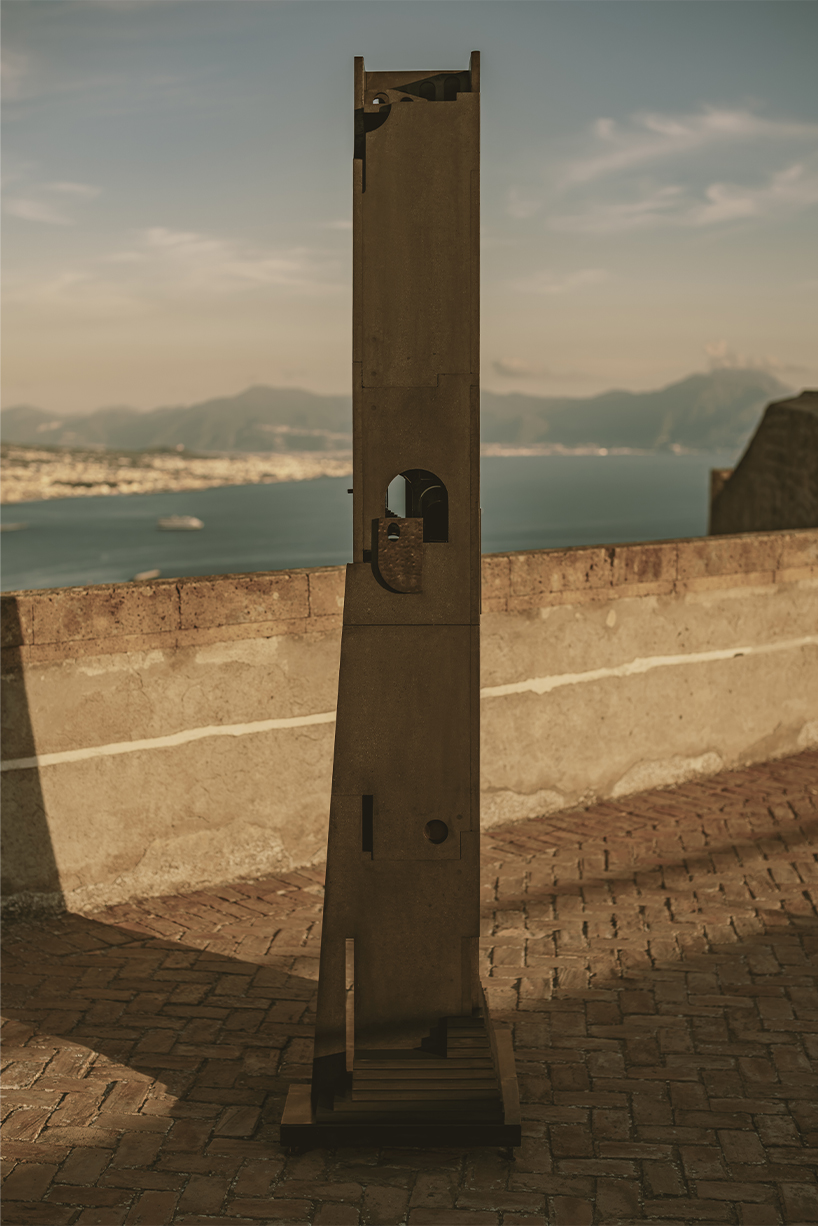 totemic sculptures compose volcanic stone landscape for site-specific installation in naples