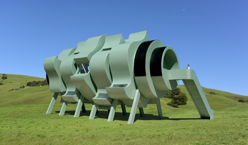 five rotating modules reconfigure to form interactive segmented house of the future