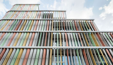translucent facade of multicolored steel louvers unfolds along seoul’s market