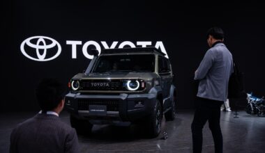 Japan's Toyota, hurt by President Trump's tariffs, reports a drop in profit