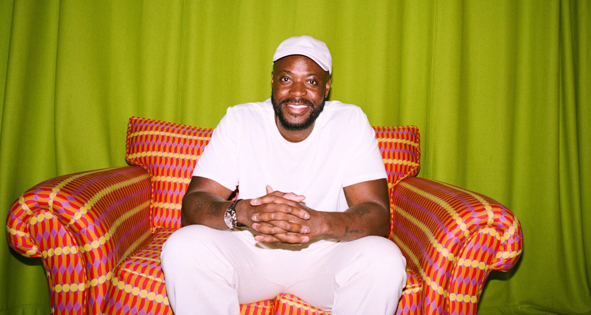 Yinka Ilori against green background