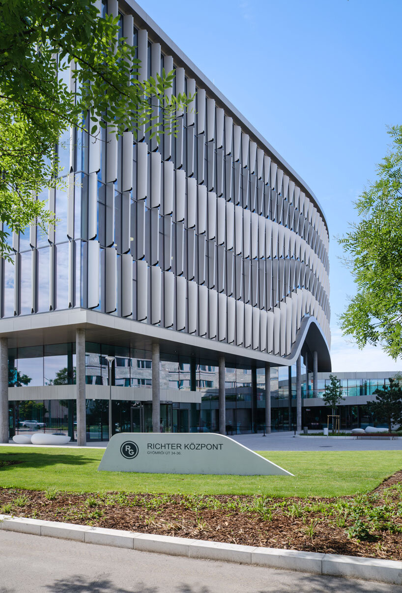 glass curtain wall envelops richter gedeon’s headquarters by ZDA in budapest