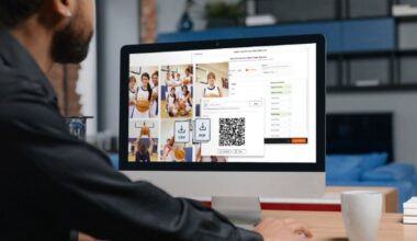 A person sits at a desk using a computer displaying images of a youth basketball team, a QR code, and options to download data as CSV or PDF files. A coffee cup is on the desk.