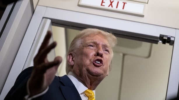 IN FLIGHT - NOVEMBER 14: U.S. President Donald Trump speaks to members of press aboard Air Force One on November 14, 2025 while in flight from Washington, DC to West Palm Beach International Airport. Trump is scheduled to spend the weekend at his Mar-A-Lago estate in Palm Beach, Florida. (Photo by R