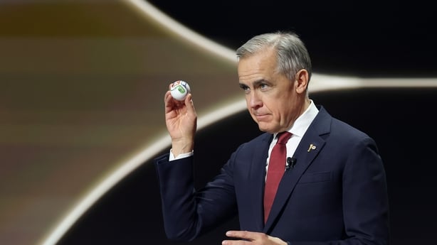 WASHINGTON, DC - DECEMBER 05: Mark Carney, Prime Minister of Canada, draws during the FIFA World Cup 2026 Official Draw at John F. Kennedy Center for the Performing Arts on December 05, 2025 in Washington, DC. (Photo by Emilee Chinn - FIFA/FIFA via Getty Images)