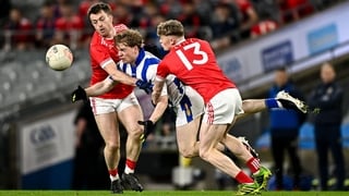 6 December 2025; Patrick Warren of Ballyboden St Enda’s in action against Athy players Niall Kelly, left, and Ronan Kelly during the AIB Leinster GAA Football Senior Club Championship final match between Athy of Kildare and Ballyboden St Enda's of Dublin