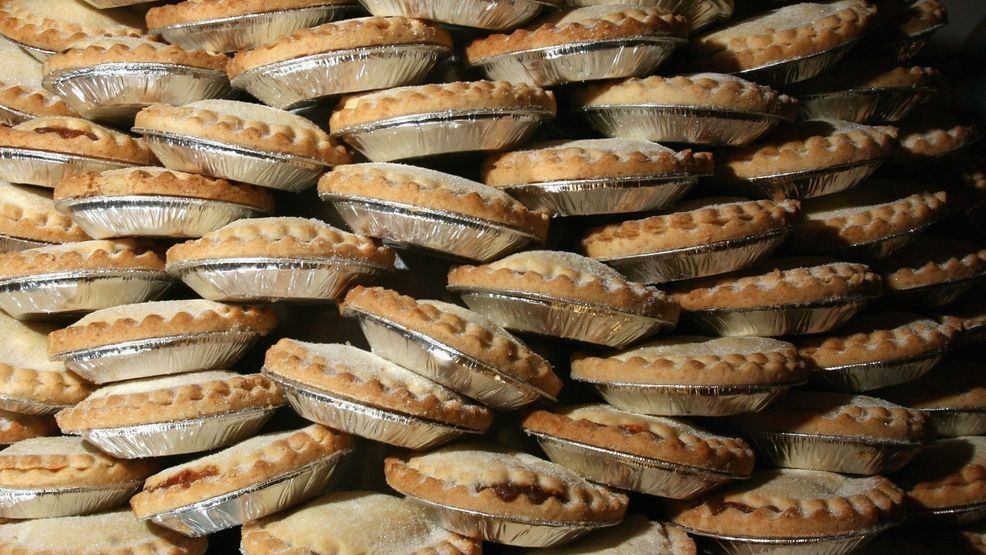 FILE - Pies wait to be eaten before the Wookey Hole Big Eat Mince Pie Eating Contest, at the Wookey Hole Show Caves on Nov. 29, 2006 in Wookey Hole, near Wells, England. (Photo by Matt Cardy/Getty Images)