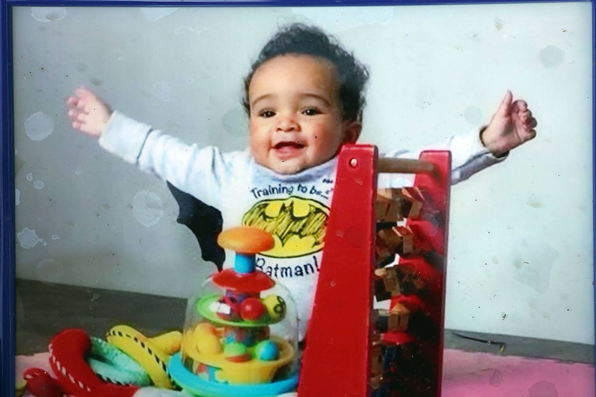 23/09/'25. Floral tributes and a photograph of 33 year old Daniel Aruebose. at the scene on open ground in Donabate, Co. Dublin where his suspected remains were discovered by Gardai last week, after being missing for four years... The search scene has since been lifter by Gardai...Picture Colin Keegan, Collins, Dublin.