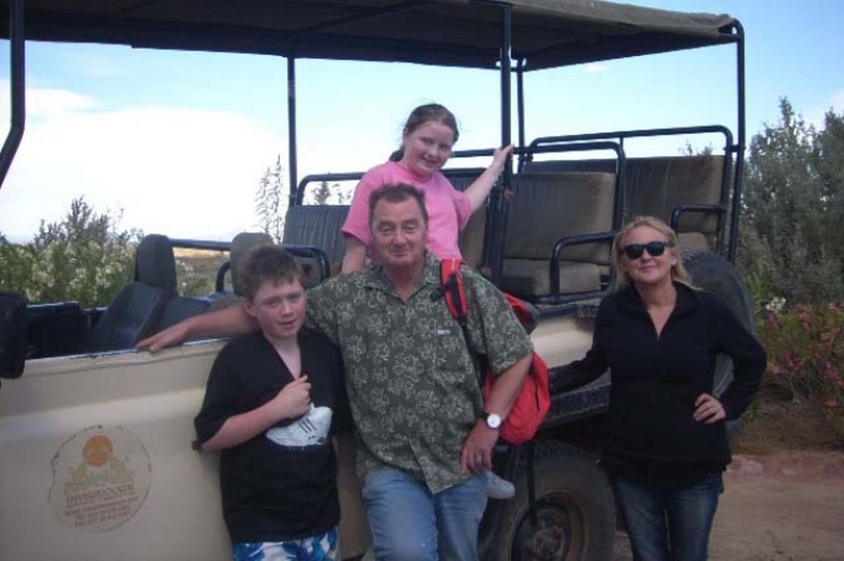 Jon Kenny with his wife Margy and their children