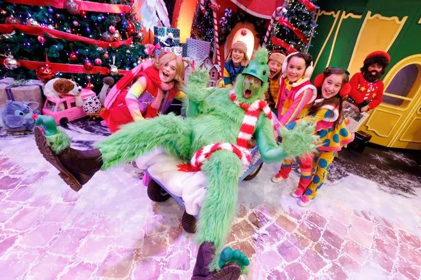 05/12/2025 Patrick Kielty dressed as the Grinch pictured during the opening of The Late Late Toy Show 2025. Picture Andres Poveda