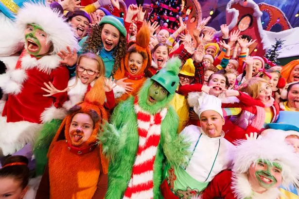 05/12/2025 Patrick Kielty dressed as the Grinch pictured during the opening of The Late Late Toy Show 2025. Picture Andres Poveda
