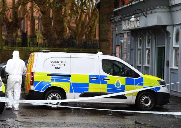 Police scientific support pictured outside the Black Horse pub on County Road 