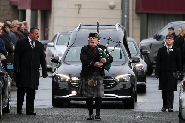 The cortege is piped into the church pictured this morning at St. Maur's Church, Rush at the funeral of Wesley O'Reilly