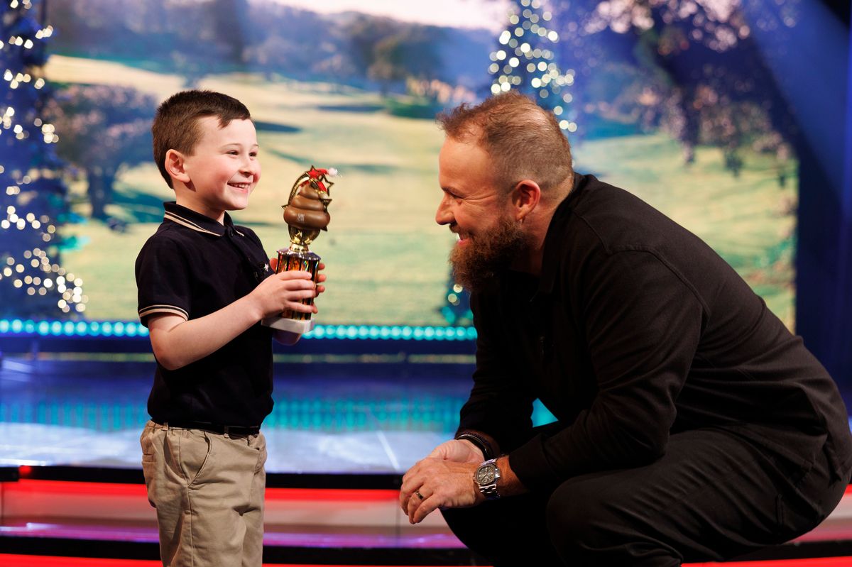 Shane Lowry and young Declan Ryan (6) from Cork pictured on the Late Late Show Christmas special