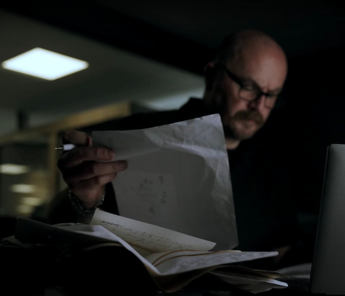 Former detective and handwriting expert John Sweetman going through cuttings from Karen Buckley murder case