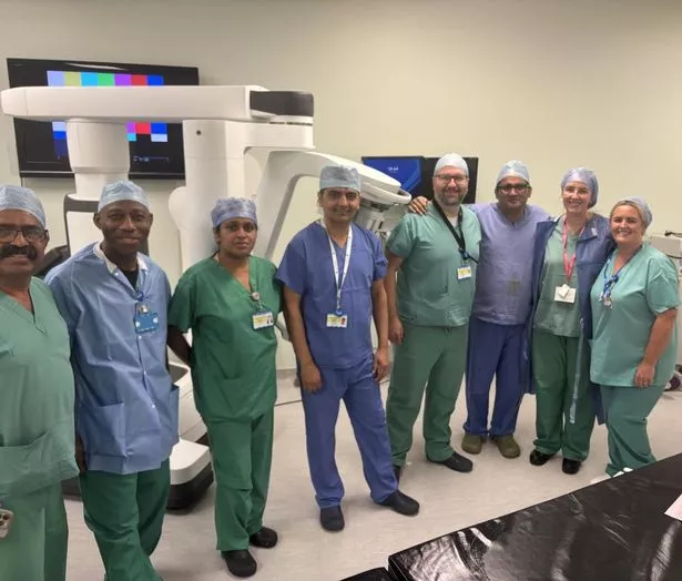 Aintree Hospital's Colorectal team with the Da Vinci single-port robot