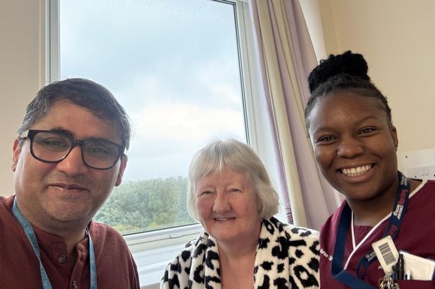 Stella Smeeton with Professor Shakil Ahmed and a member of the Colorectal team