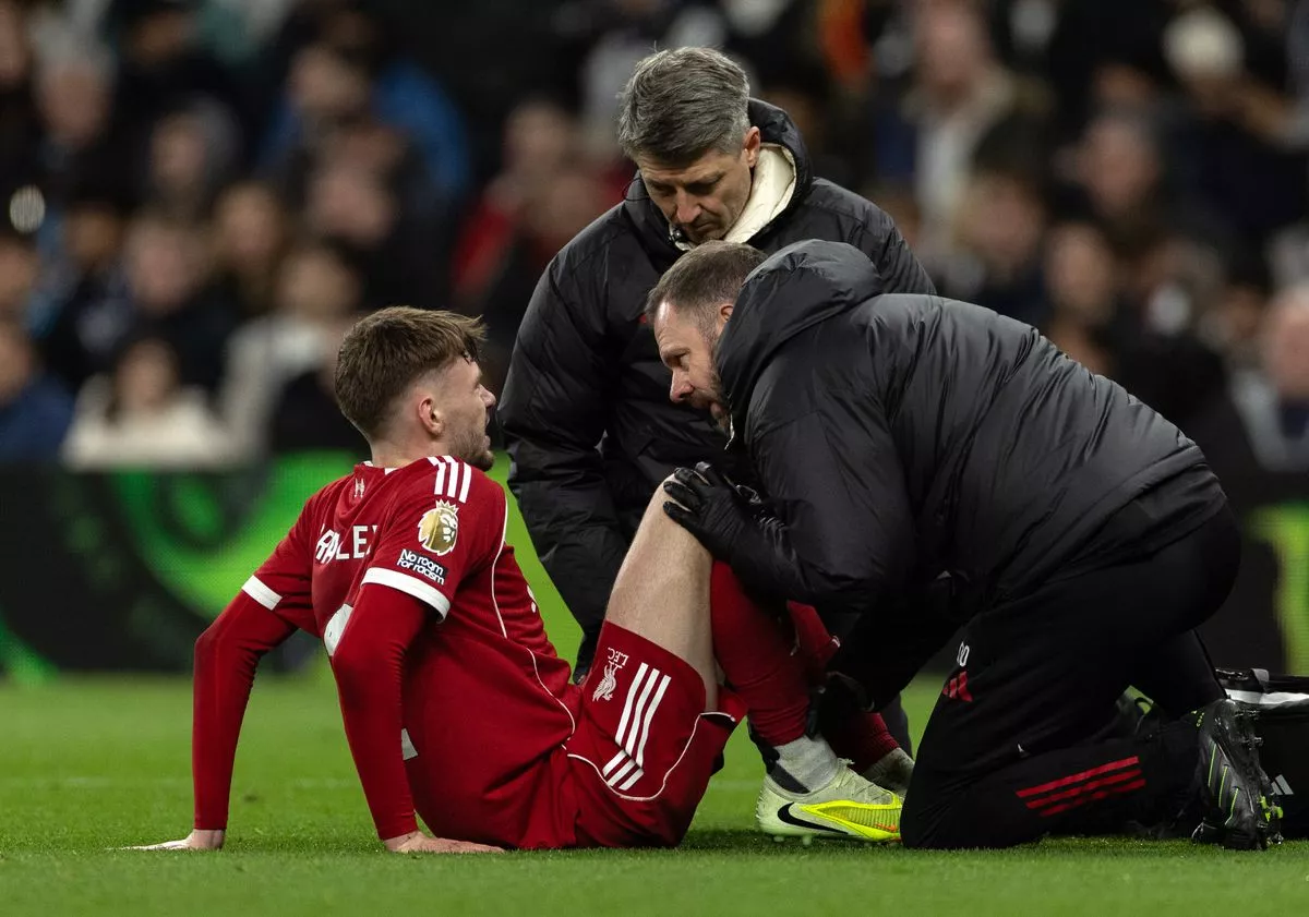 LONDON, ENGLAND - DECEMBER 20: Conor Bradley of Liverpool is treated by medical staff after going down injured during the Premier League match between Tottenham Hotspur and Liverpool at Tottenham Hotspur Stadium on December 20, 2025 in London, England. (Photo by Joe Prior/Visionhaus via Getty Images)