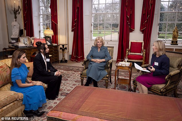 Queen Camilla today hosted an afternoon tea reception for an economic abuse charity and survivors at Clarence House