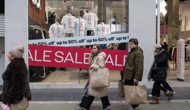 Shoppers walk along Oxford Street during Boxing Day sales in London on December 26, 2025