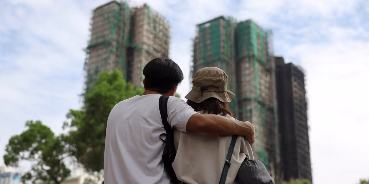 Hong Kong’s Response to Deadly Fire Is Squeezed by China’s Firm Hand