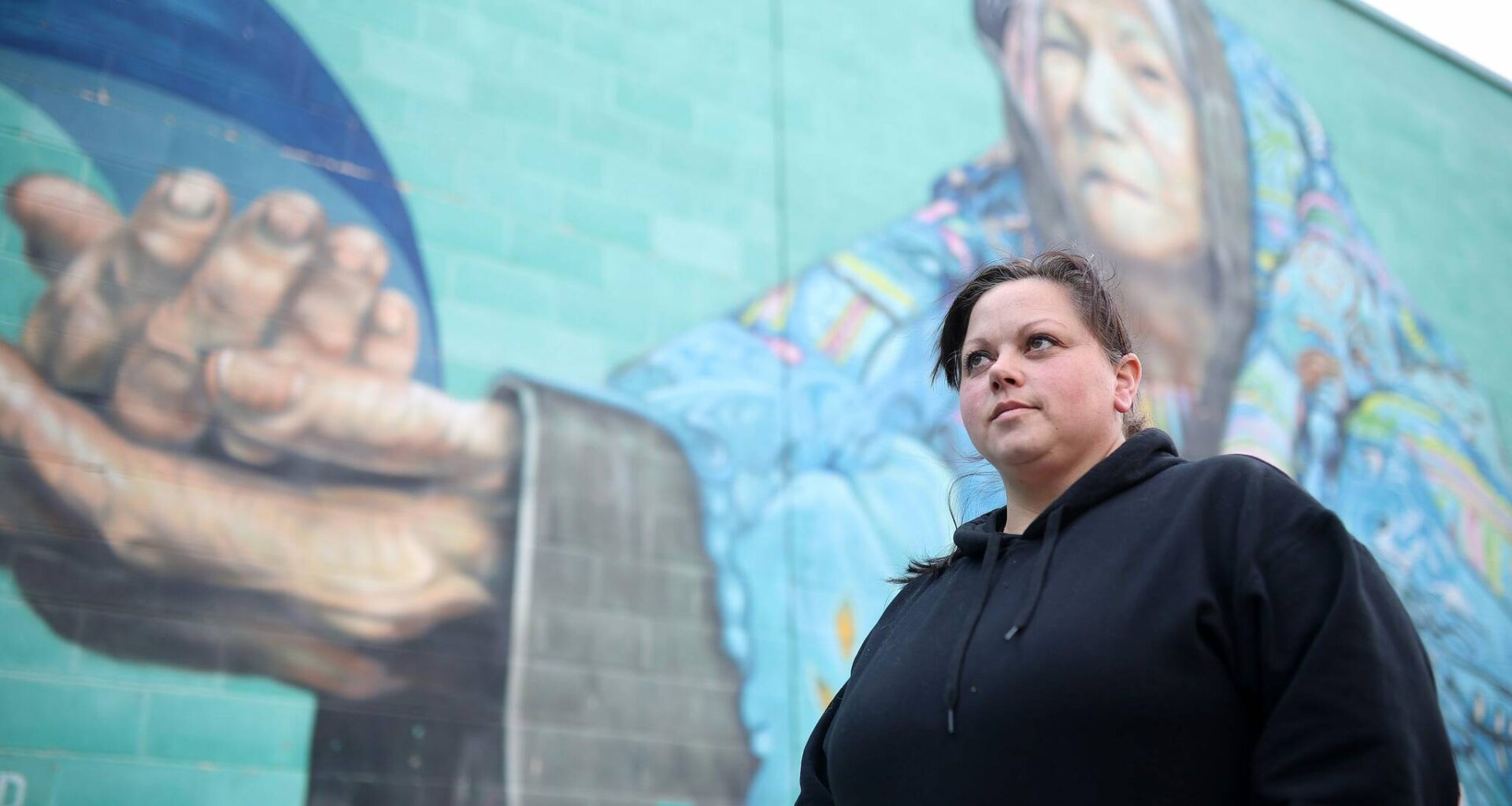 Angela Braun, executive director of Helping Hands Centre of Brandon Inc., stands outside the local soup kitchen on Friday. The centre has served more than 51,000 meals this year, up from 46,000 in 2024, Braun said. (Photos by Tim Smith/The Brandon Sun)