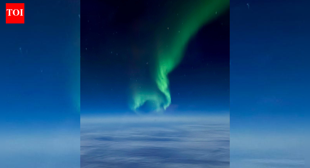 Dancing skies over the North Pole: Northern lights captured from 35,000 feet
