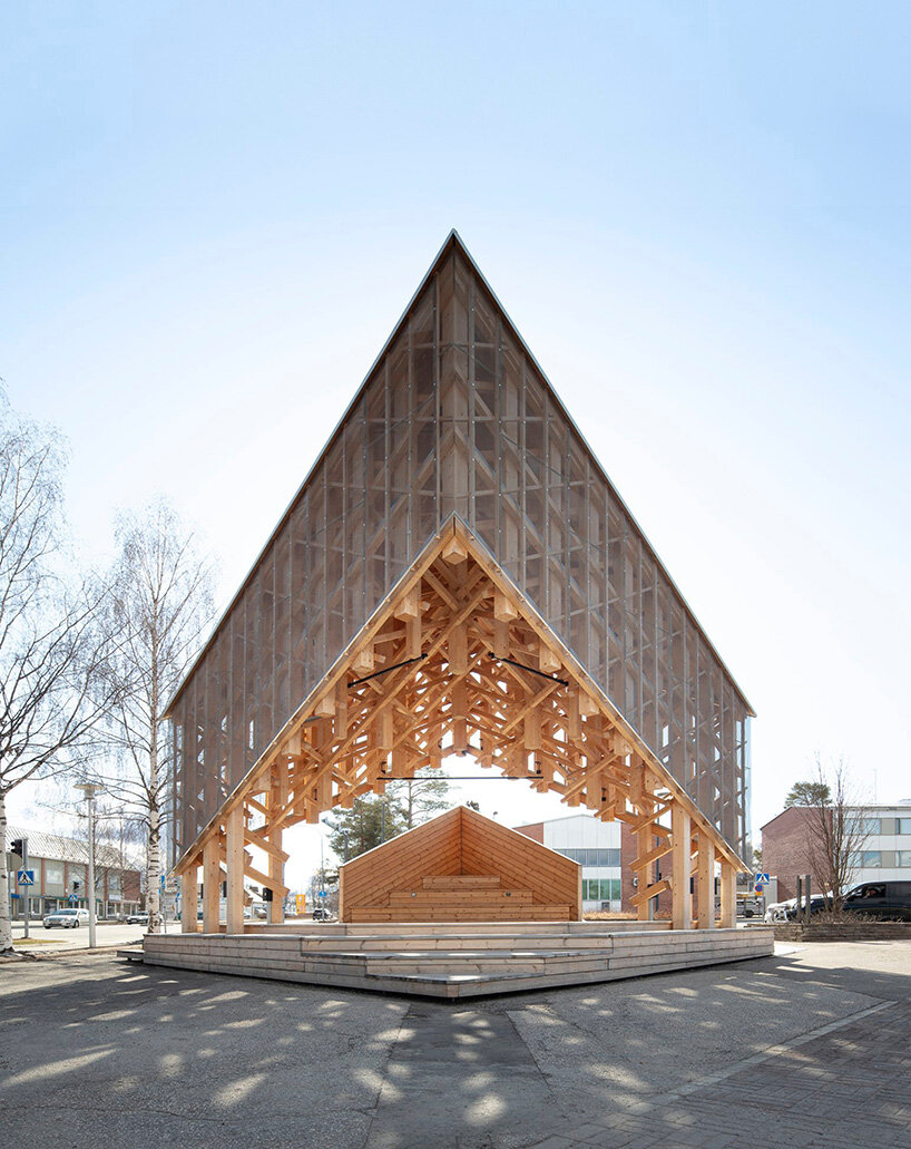 crystalline timber canopy inspired by snow fractals becomes a gathering space in finland