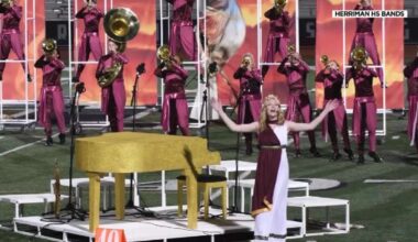Musician surprises Herriman High School marching band while on tour