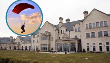 Paraglider rescued and taken to hospital after crashing onto roof at five-star resort